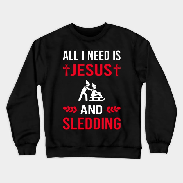 I Need Jesus And Sledding Sledging Sleighing Crewneck Sweatshirt by Good Day